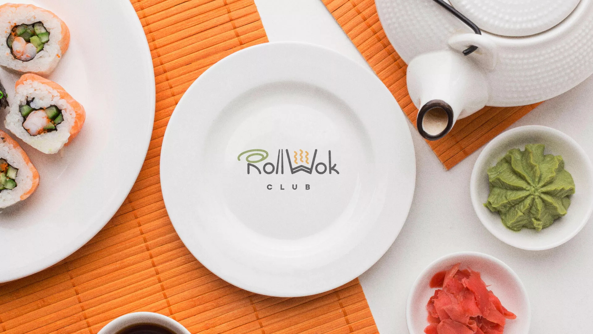 Разработка логотипа и фирменного стиля в Усинске для суши-бара «Roll Wok Club» Разработка логотипа и фирменного стиля в Усинске для суши-бара «Roll Wok Club»